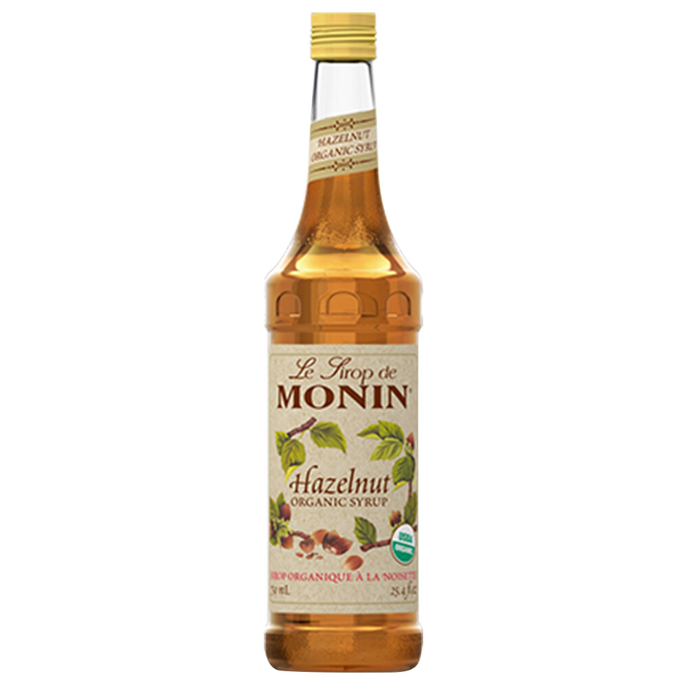 Monin 750 mL Organic Hazelnut Flavoring Syrup