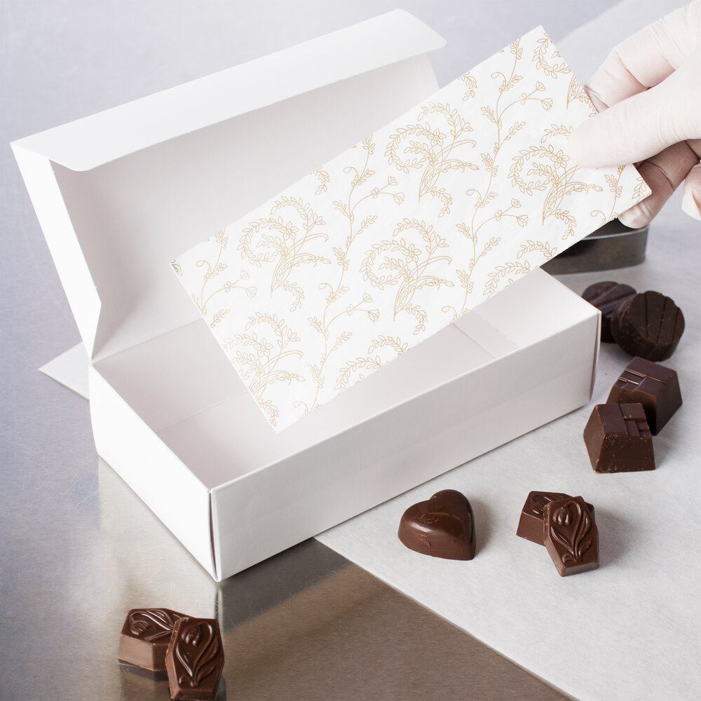 7" x 3 1/4" White 1 lb. 3Ply Glassine Candy Box Pad With Ivory Pattern