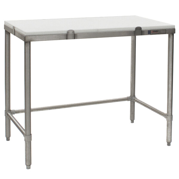 A stainless steel Eagle Group chopping table with a white poly top on a metal table.