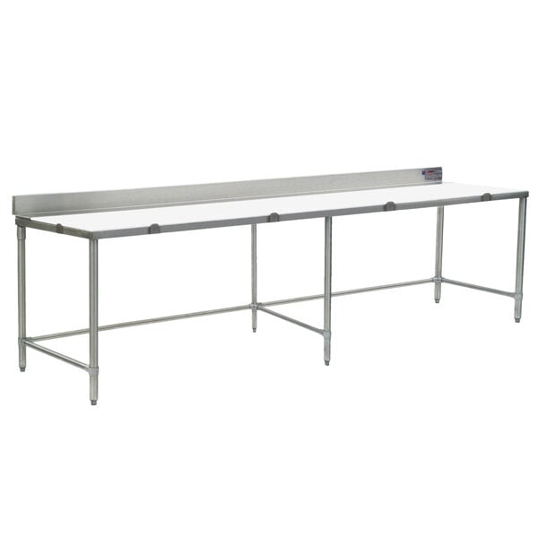 An Eagle Group stainless steel work table with a white poly top on metal legs.