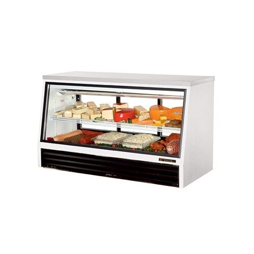 A True refrigerator left hand door assembly with a glass door on a shelf with a variety of cheese.