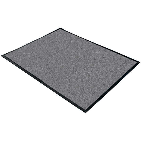 A gray rectangular carpet with a black border.