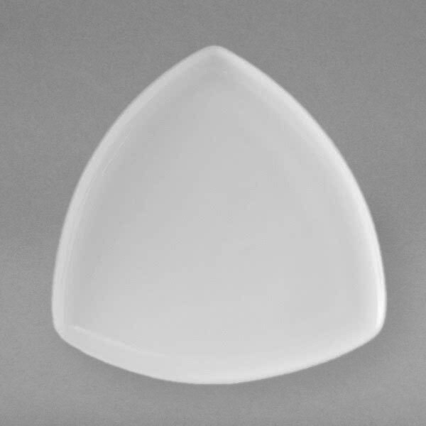 A white triangle shaped Tuxton china plate.