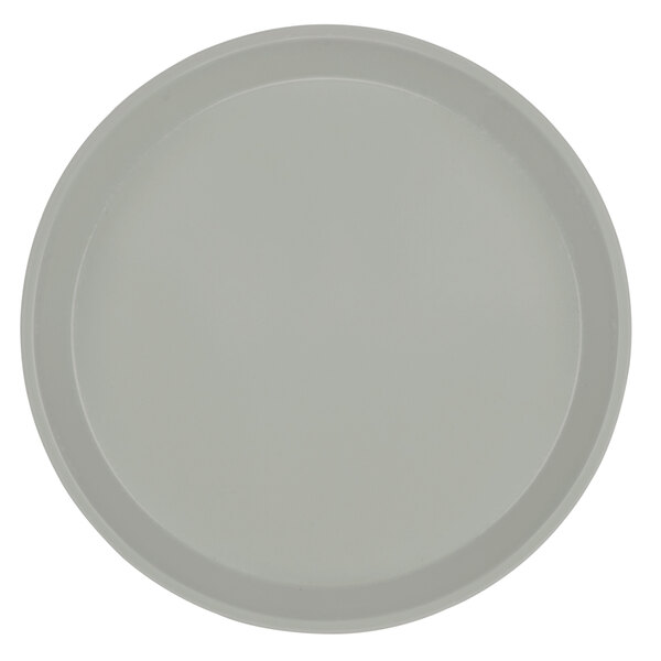 A taupe Cambro round tray with a white background.