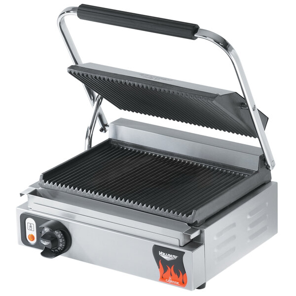 A Vollrath stainless steel panini grill with grooved top and bottom plates.