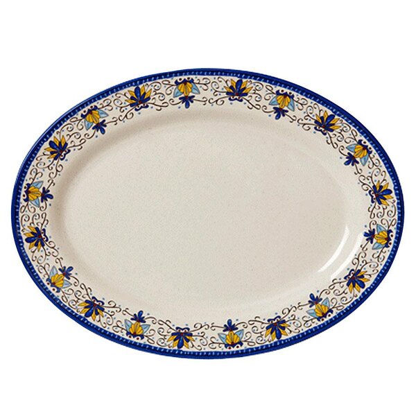 A white oval GET Santa Lucia melamine platter with blue and yellow designs.