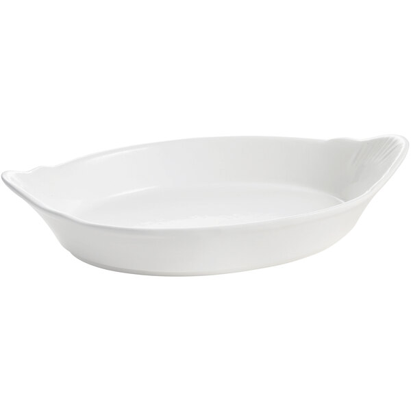 A white oval Tablecraft au gratin dish with a handle.