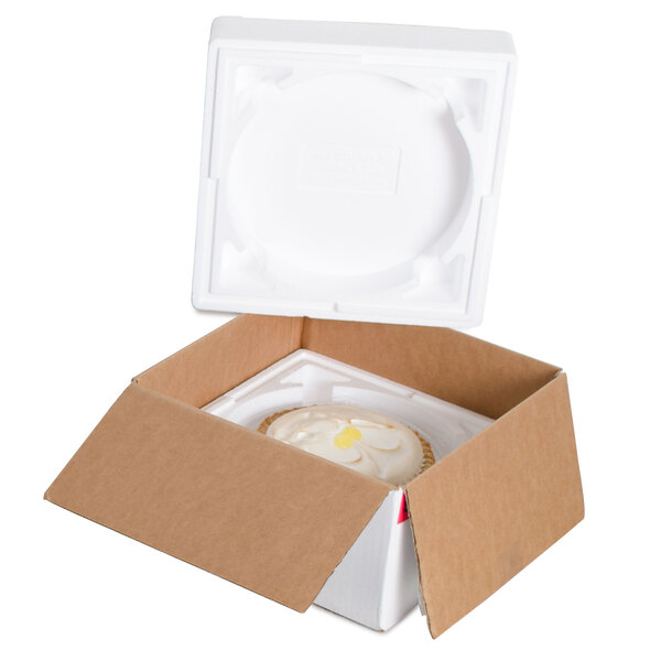 A white foam box with a pie inside.