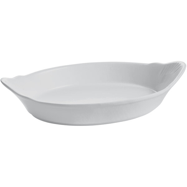 A white oval shaped Tablecraft au gratin dish with a handle.