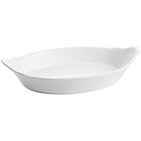 A white oval shaped Tablecraft Au Gratin dish with a handle.