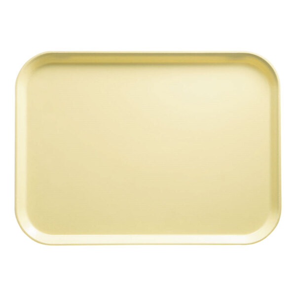 A rectangular yellow Cambro tray with a white border.