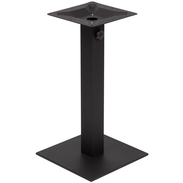 A black metal stand with a square base and umbrella hole.