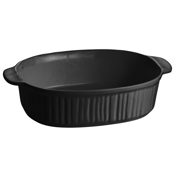 A black oval Tablecraft casserole dish with ribbed edges and handles.