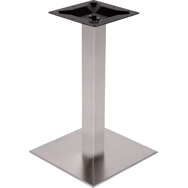 A metal and black square table base.