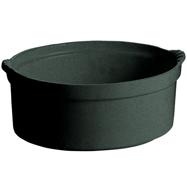 A black round pot with a handle and green speckles on a white background.
