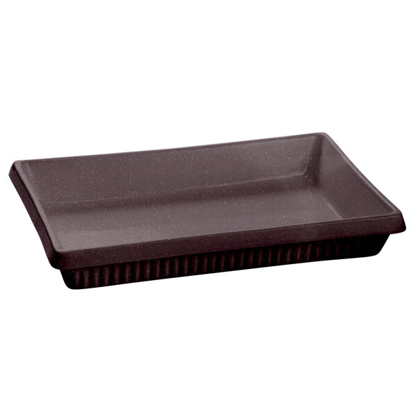 A brown rectangular Tablecraft cast aluminum casserole dish with a black speckled interior and black handle.