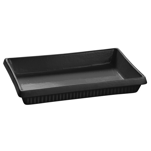 A black rectangular Tablecraft cast aluminum casserole dish with a lid.