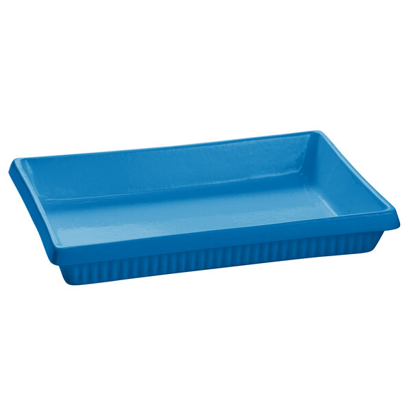 A sky blue rectangular cast aluminum tray with a white surface.