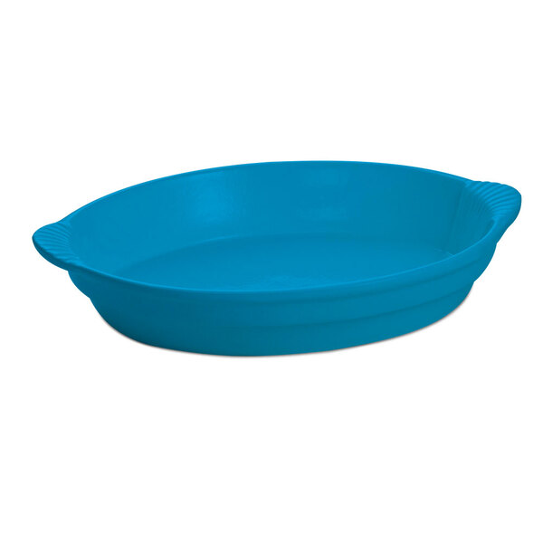 A sky blue oval cast aluminum casserole dish with handles.