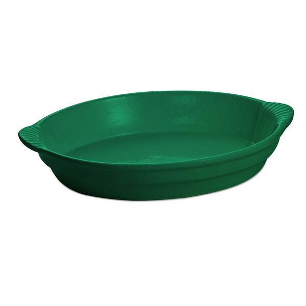 A green Tablecraft oval cast aluminum casserole dish with a handle.