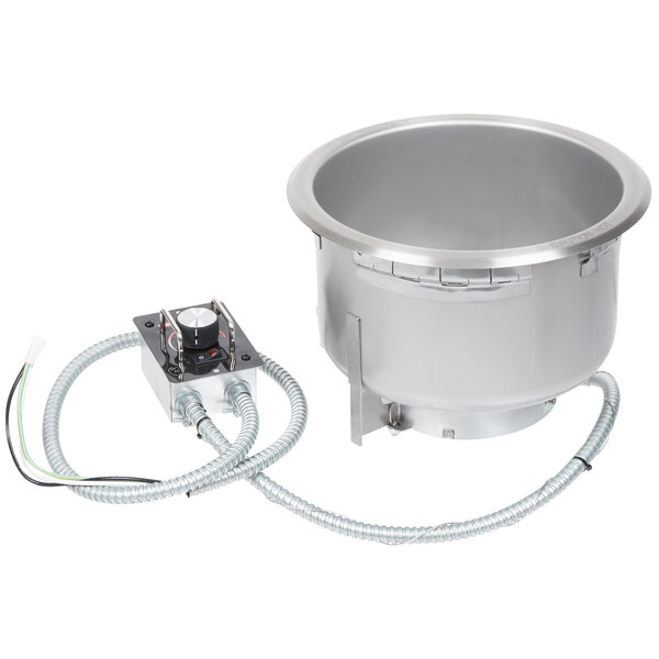 A large silver Hatco drop-in heated soup well with a drain hose attached.