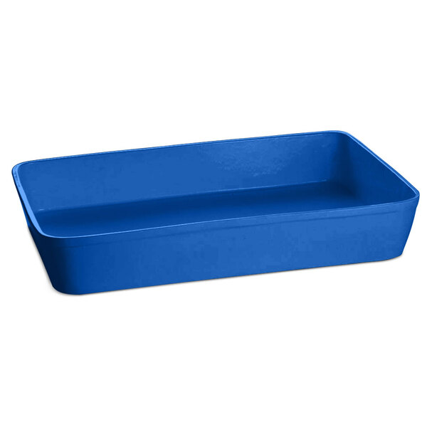 A cobalt blue rectangular cast aluminum casserole dish with a handle.