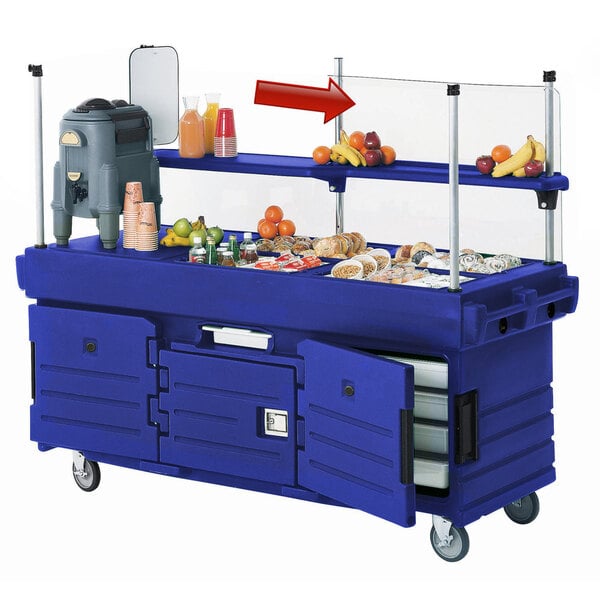 A blue Cambro food cart with a sneeze guard on top.