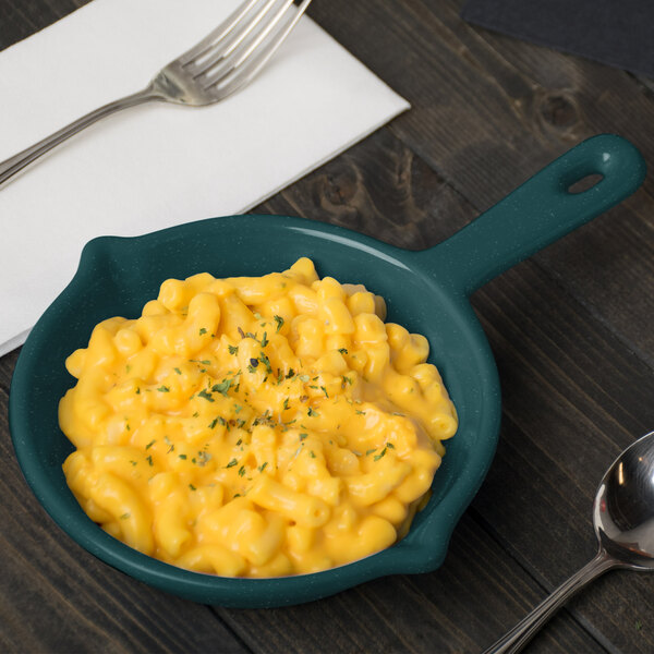 A Tablecraft hunter green fry pan with macaroni and cheese on a table.