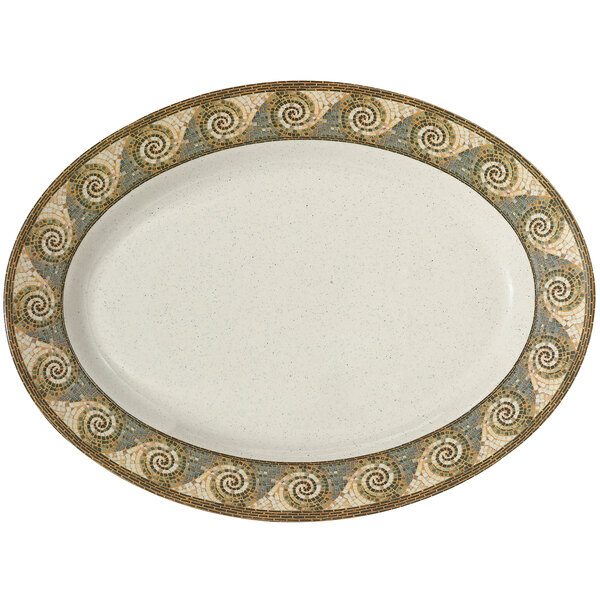 A white oval platter with a gold and brown mosaic design.