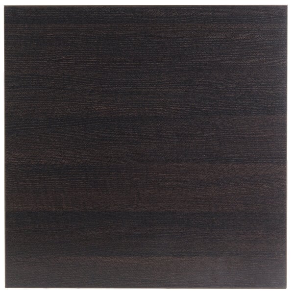 A dark brown BFM Seating square tabletop on a table.