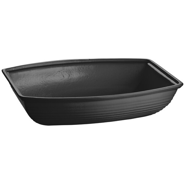 A black rectangular cast aluminum bowl with curved edges.