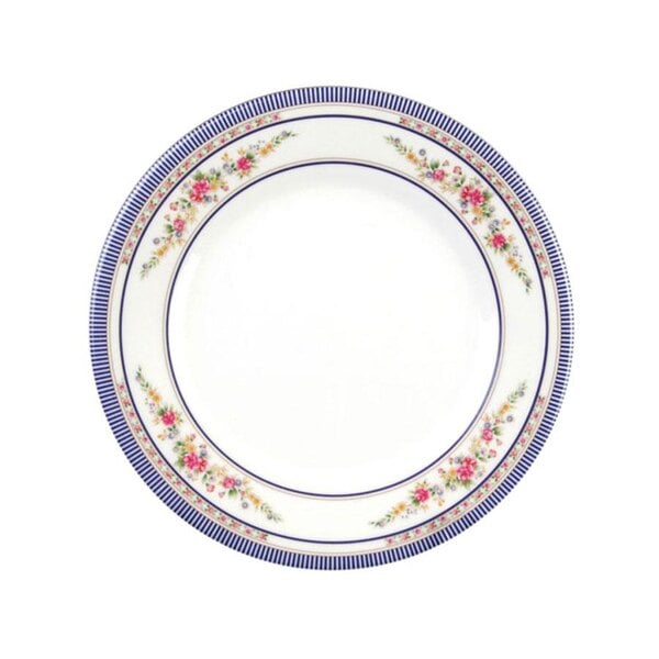 A white plate with blue trim and blue and pink flowers.
