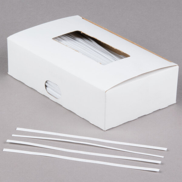 A white box of Bedford Industries Inc. white paper bag ties.