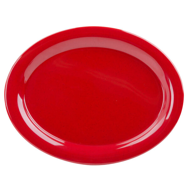 A red oval platter with a speckled surface.