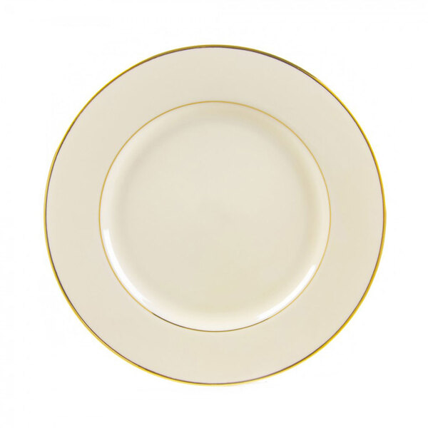 A white porcelain luncheon plate with a gold rim.