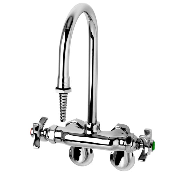 A chrome T&S laboratory faucet with 4-arm handles and a green handle.