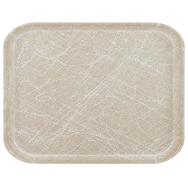 A tan rectangular fiberglass tray with black and white lines.