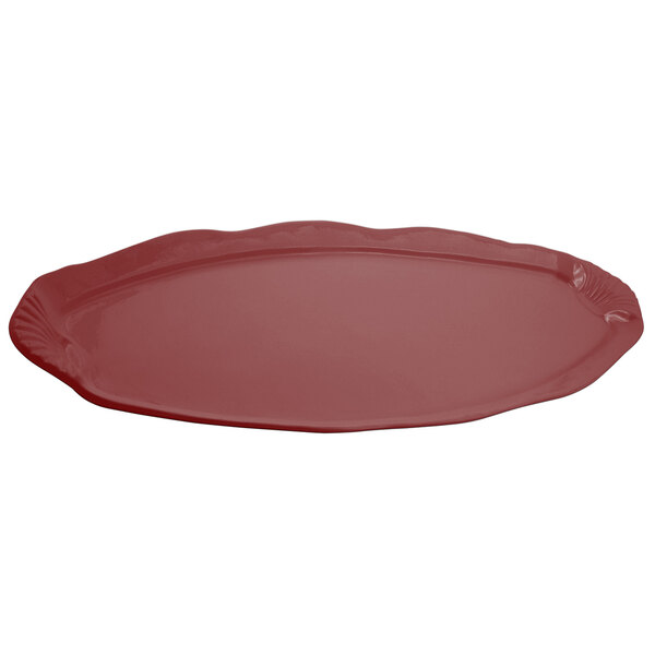 A red rectangular Bon Chef cast aluminum shell and fish platter with wavy edge.