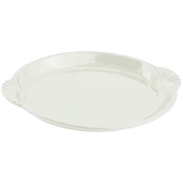 A white cast aluminum shell and fish platter with a scalloped edge.
