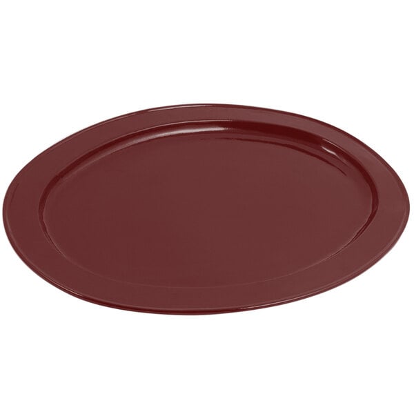 A red oval Bon Chef cast aluminum platter with a terra cotta sandstone finish.