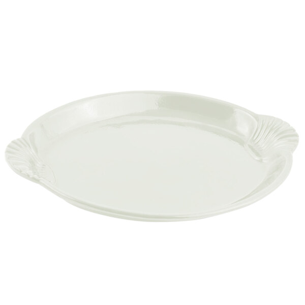 A white cast aluminum shell and fish platter with a scalloped edge.