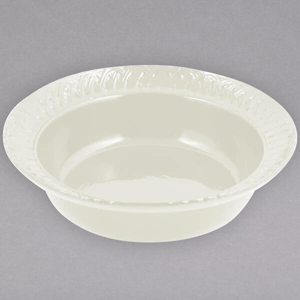 A white bowl with a decorative edge.