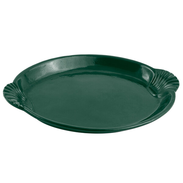 A hunter green Bon Chef cast aluminum shell and fish platter with a scalloped edge.