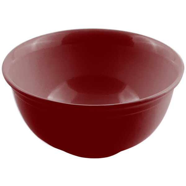 A red Bon Chef cast aluminum tulip bowl with a white spot.