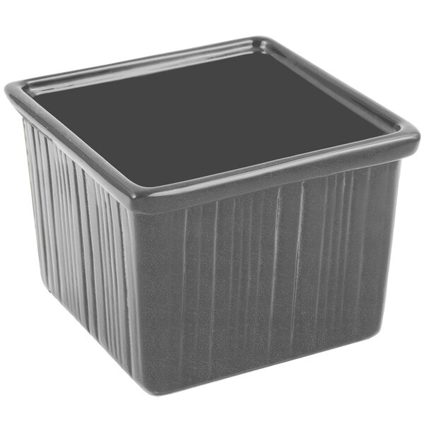 A smoke gray square pot with a black lid.