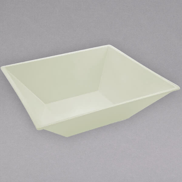A white flared bowl with a textured finish.