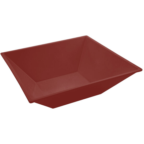 A red flared bowl with a sandstone finish on a white background.
