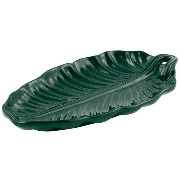 A green leaf shaped Bon Chef cast aluminum platter.