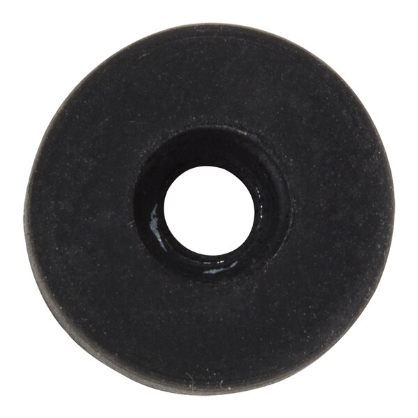 A black rubber round with a hole in the middle.
