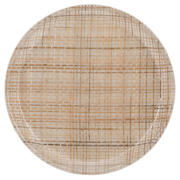 A round Cambro plate with a woven pattern.